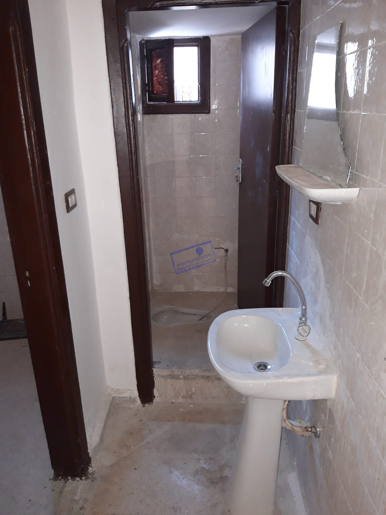 شقة للبيع – بناء ملبس حجر وكراج سيارات ومصعد مساحة ١١٥متر